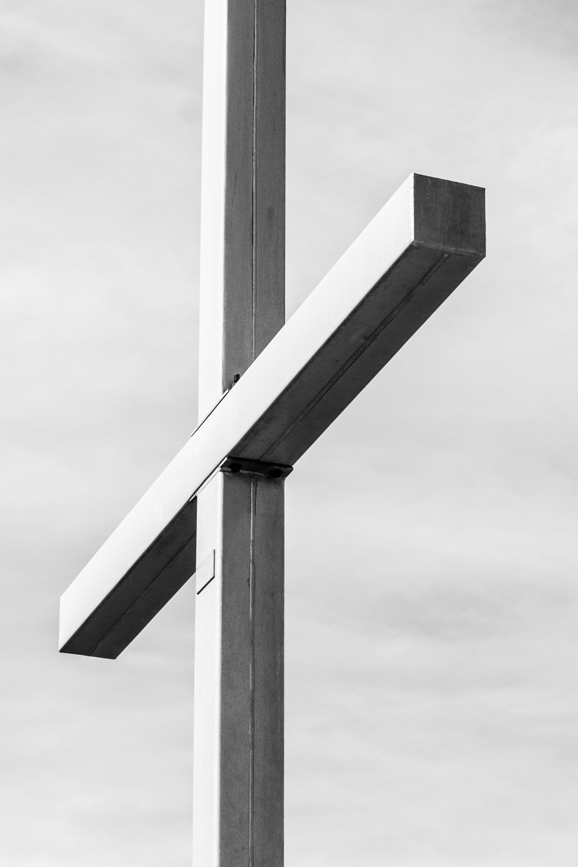 Giant metal cross in black and white